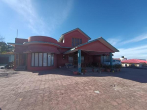 Pink wood Homestays